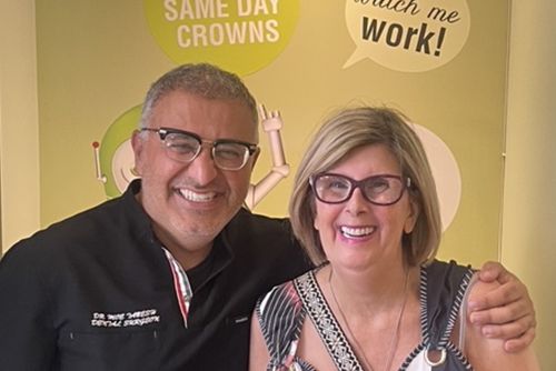 dental implants Kingston patient smiling after full smile restoration Greenwood Park Dentistry